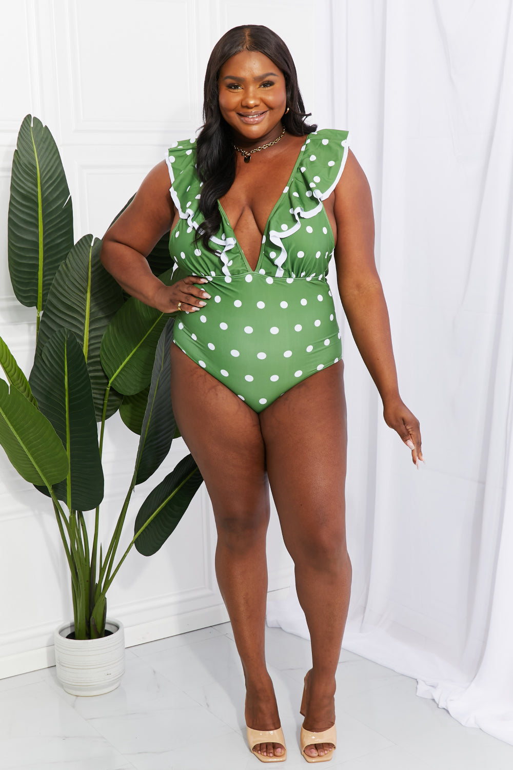 Moonlit Dip Ruffle Plunge Swimsuit in Green Polka Dot